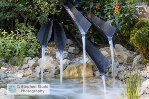 Photographer: Stephen Studd - The Telegraph Garden, bronze chute water feature, rock pool, Isoplexis canariensis - Designer: Andy Sturgeon - Sponsor: The Telegraph